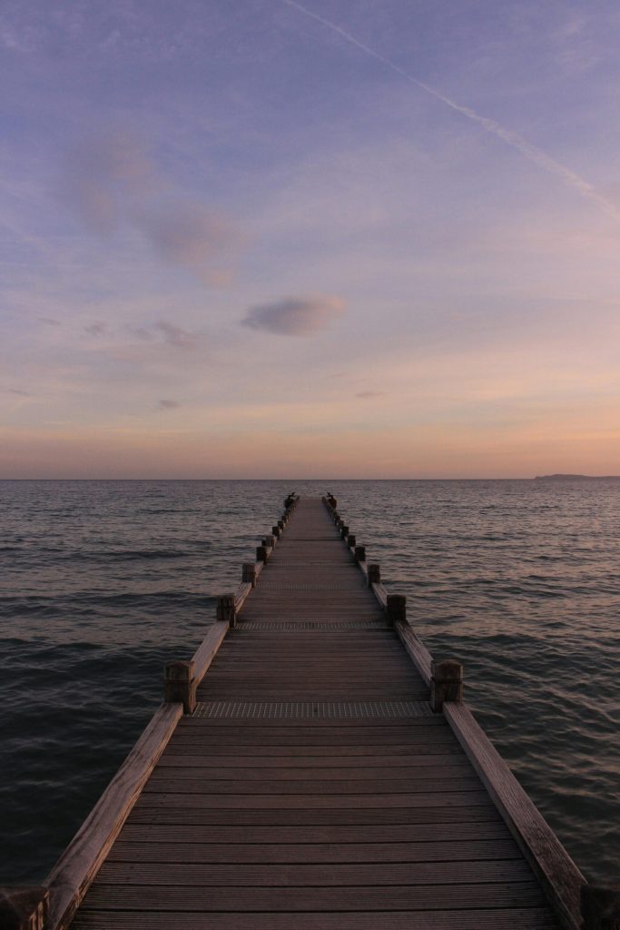 Brown Wooden Dock on Body of Water